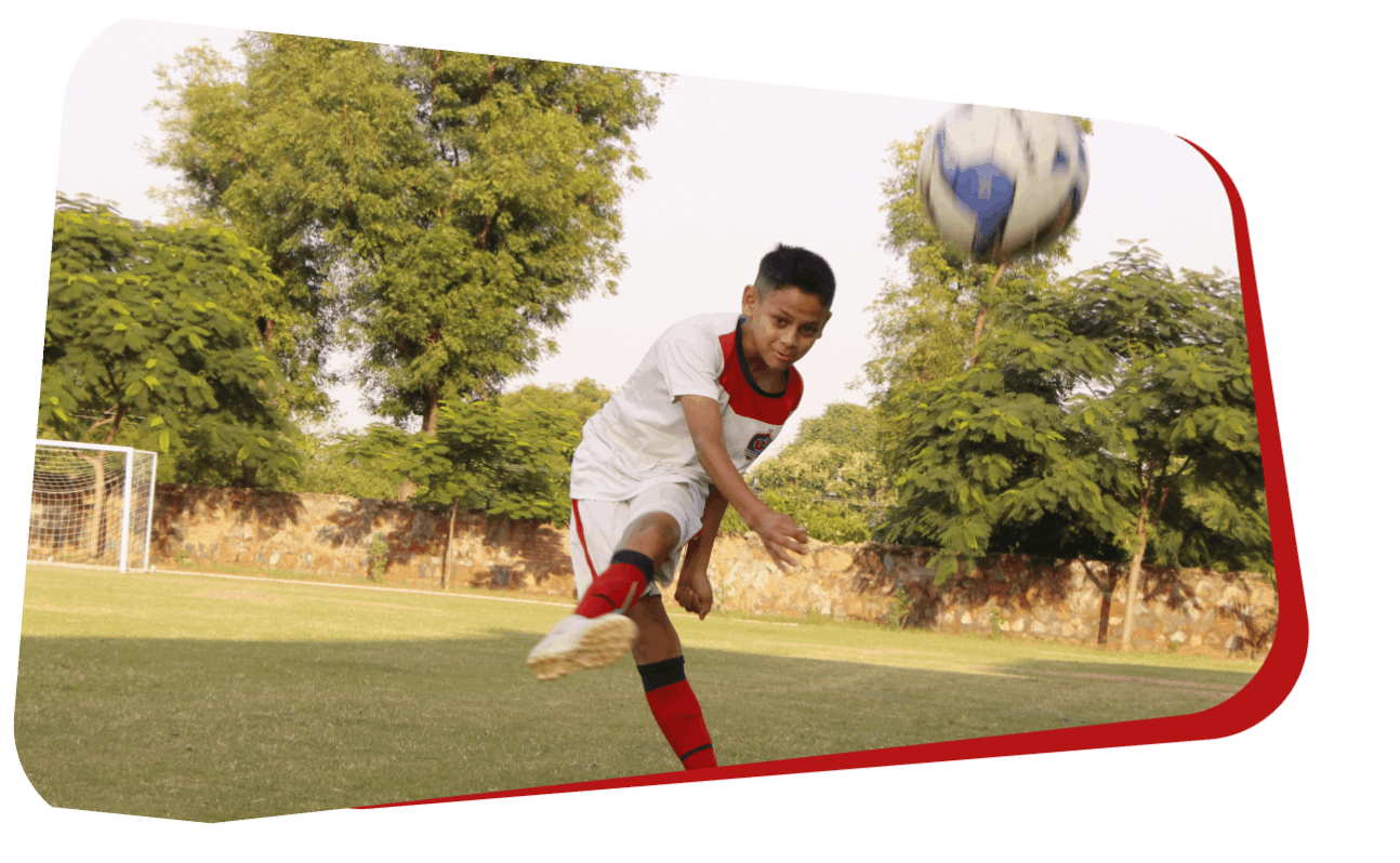 Residential school student dribbling past a defender